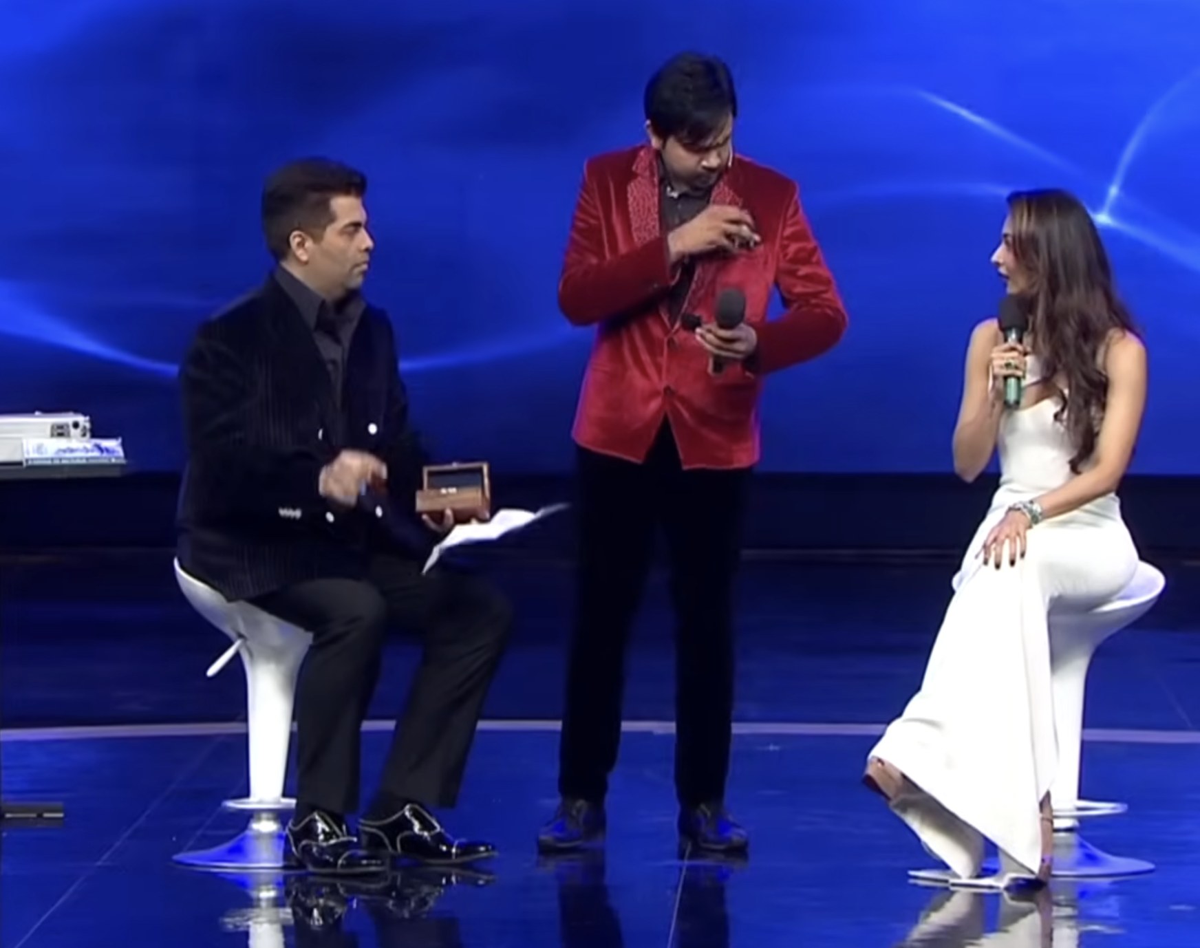 Ravinder Kumar performing a live hypnosis demonstration